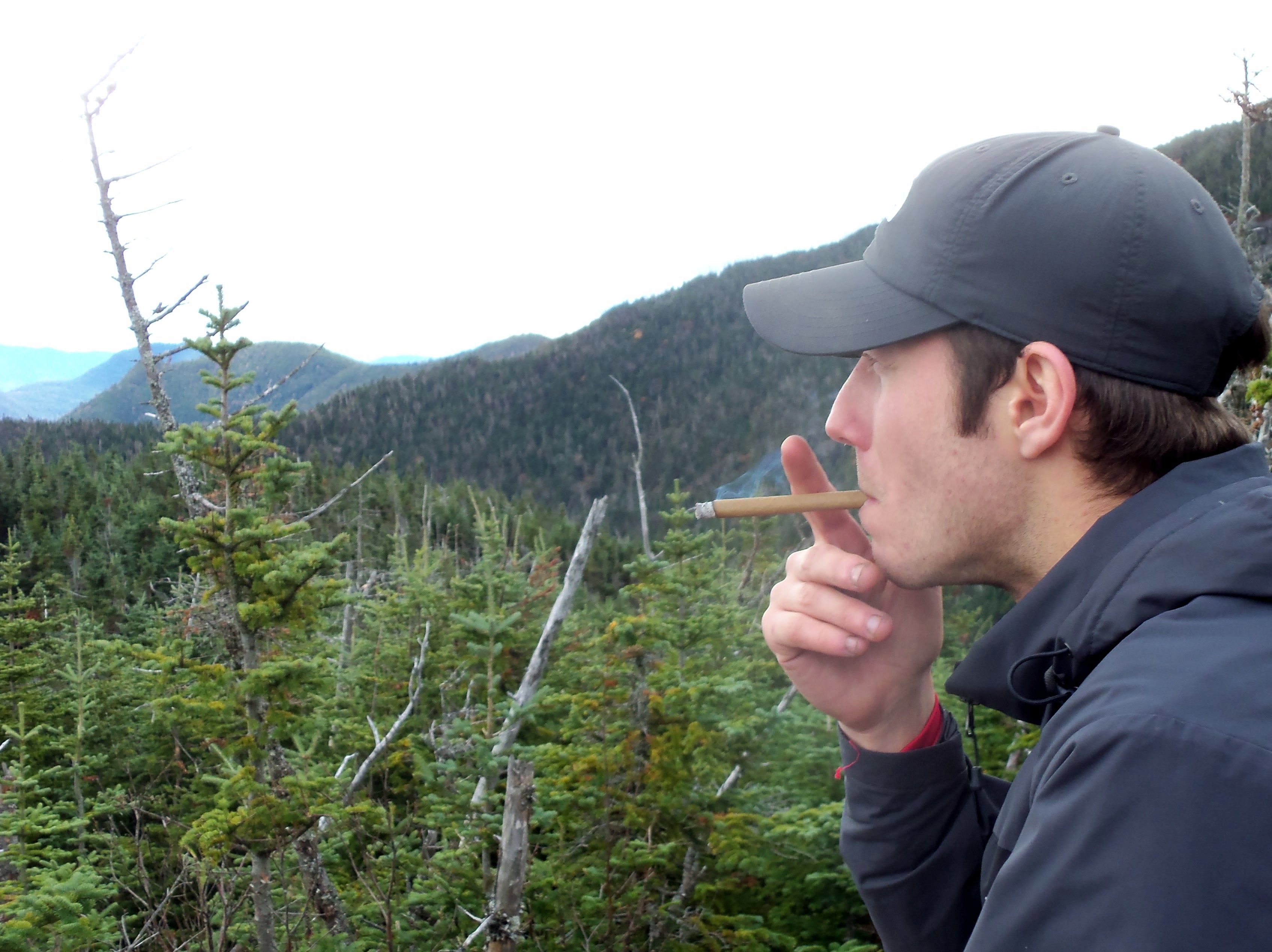 Matt enjoys a cigar on Upper Wolfjaw