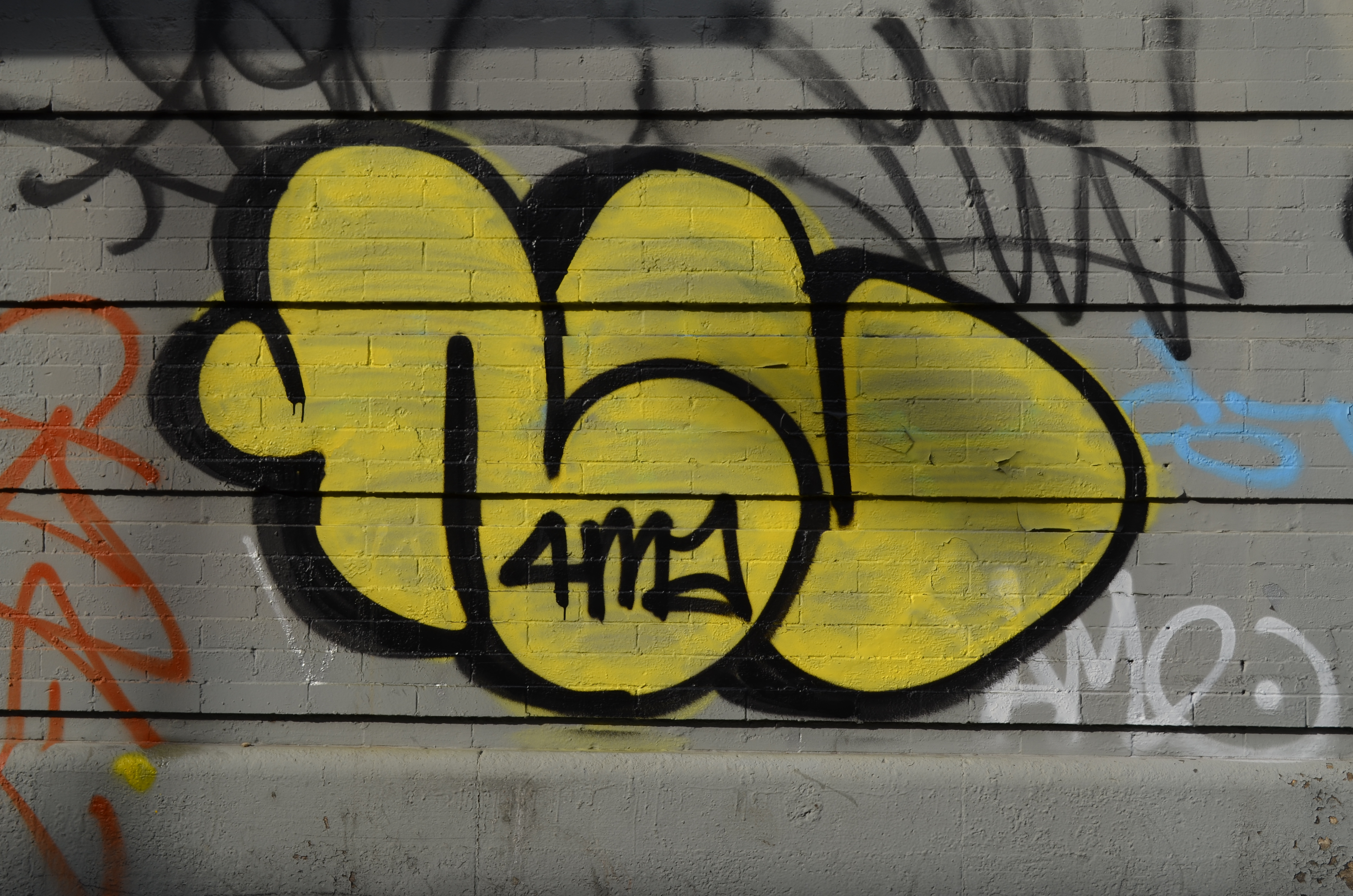 yellow and black graffiti