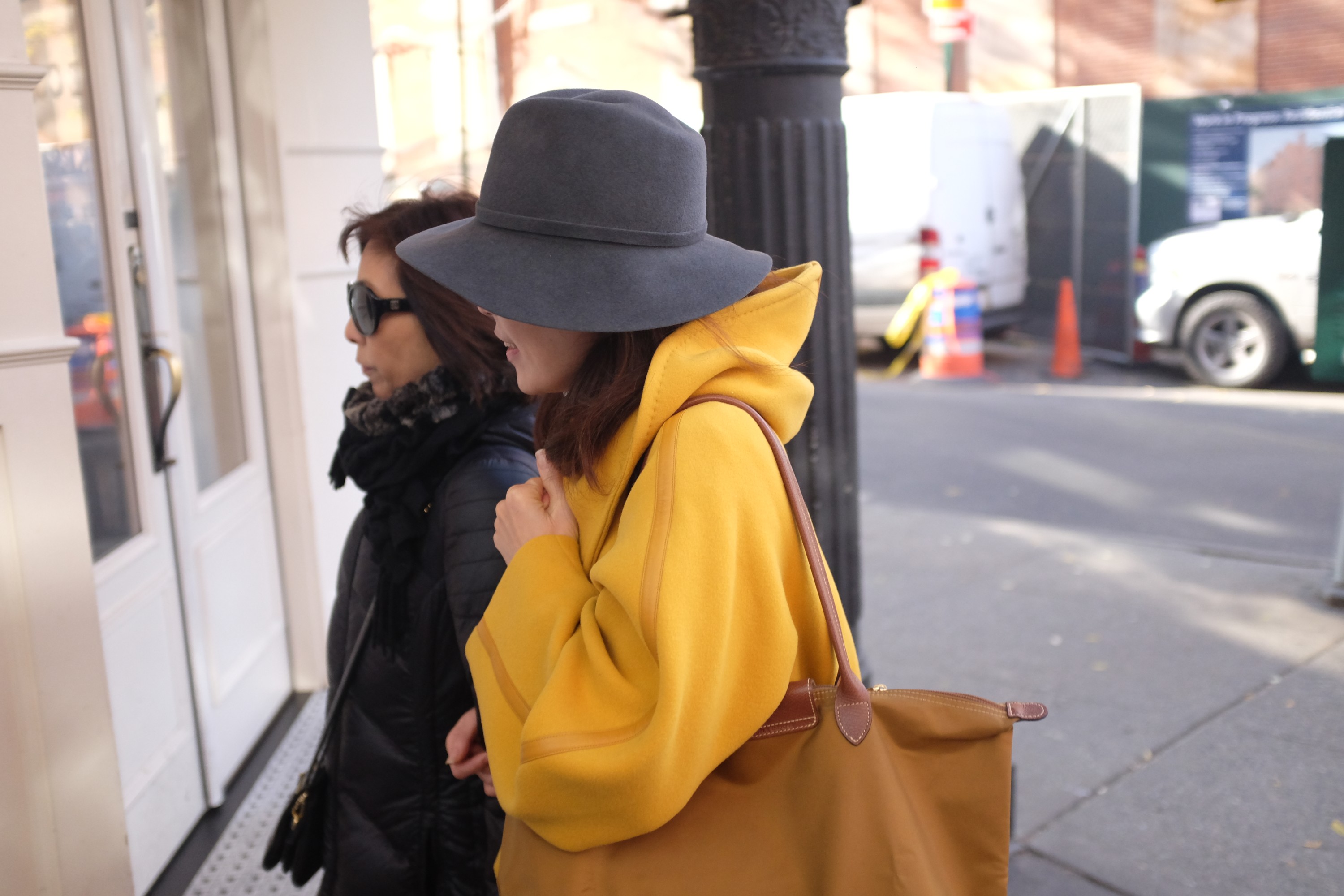 woman in yellow coat