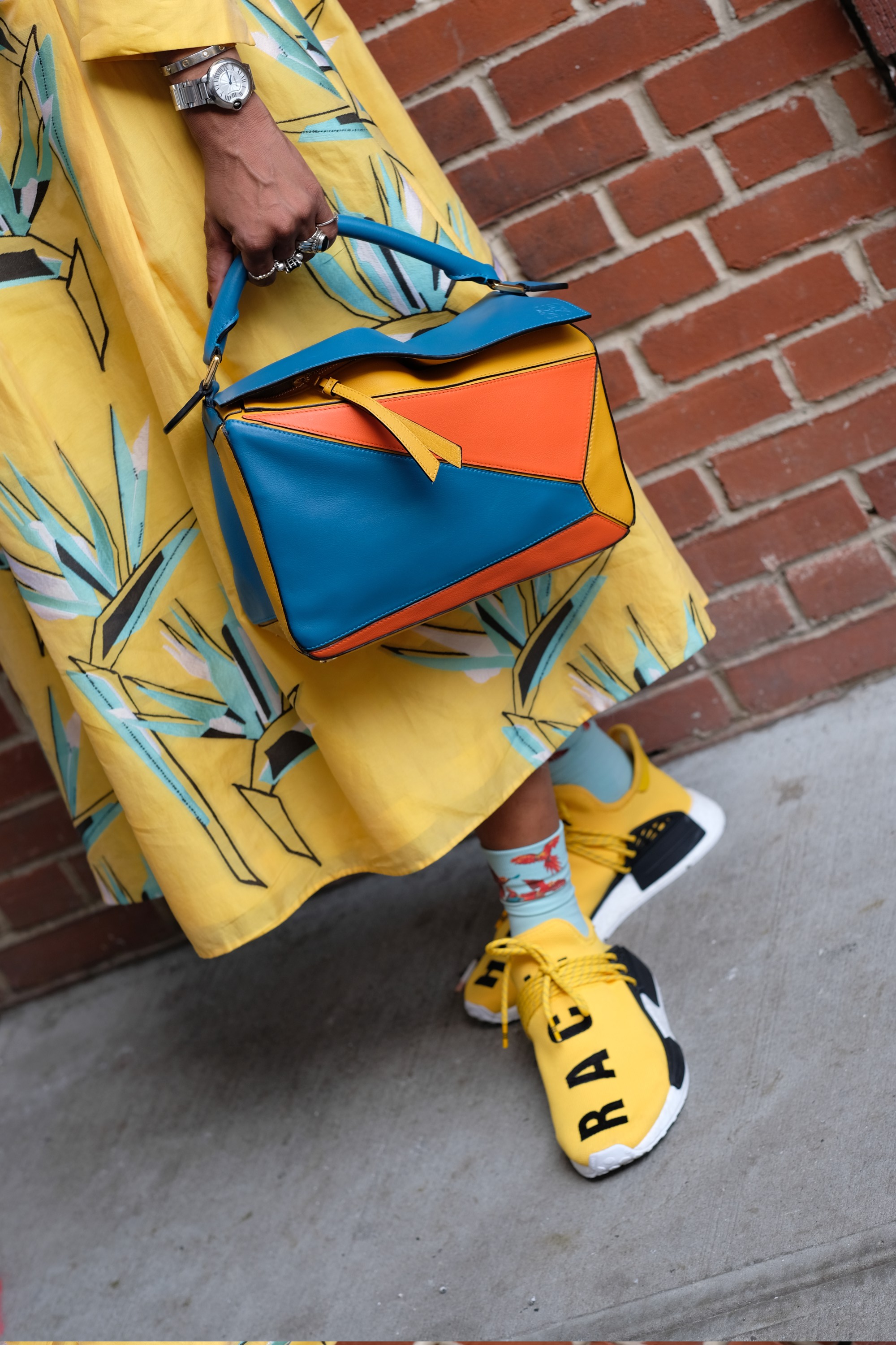 colorful bag and yellow outfit