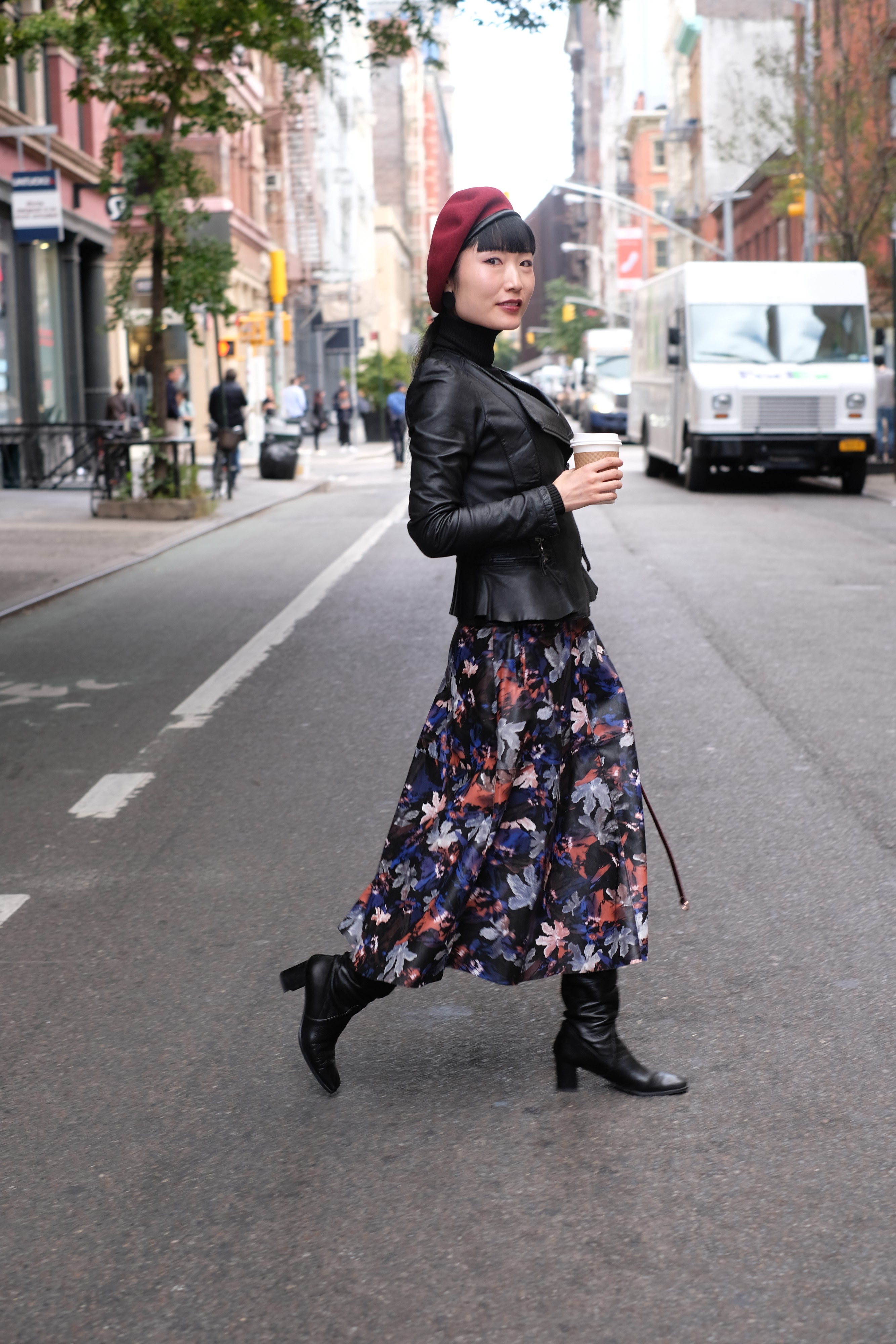 Asian girl in floral dress and black jacket