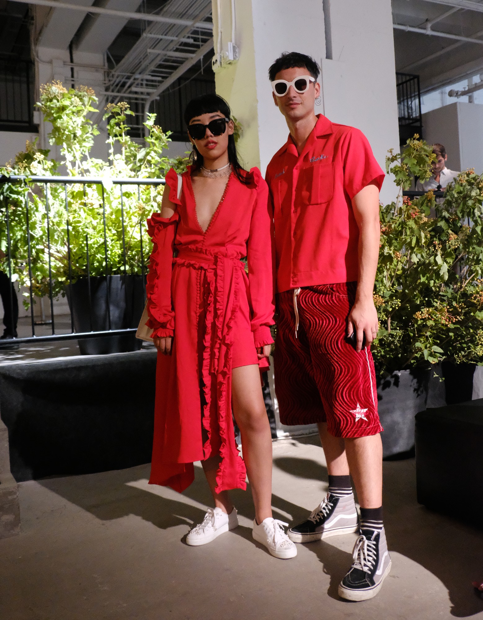 2 fashionistas dressed in red