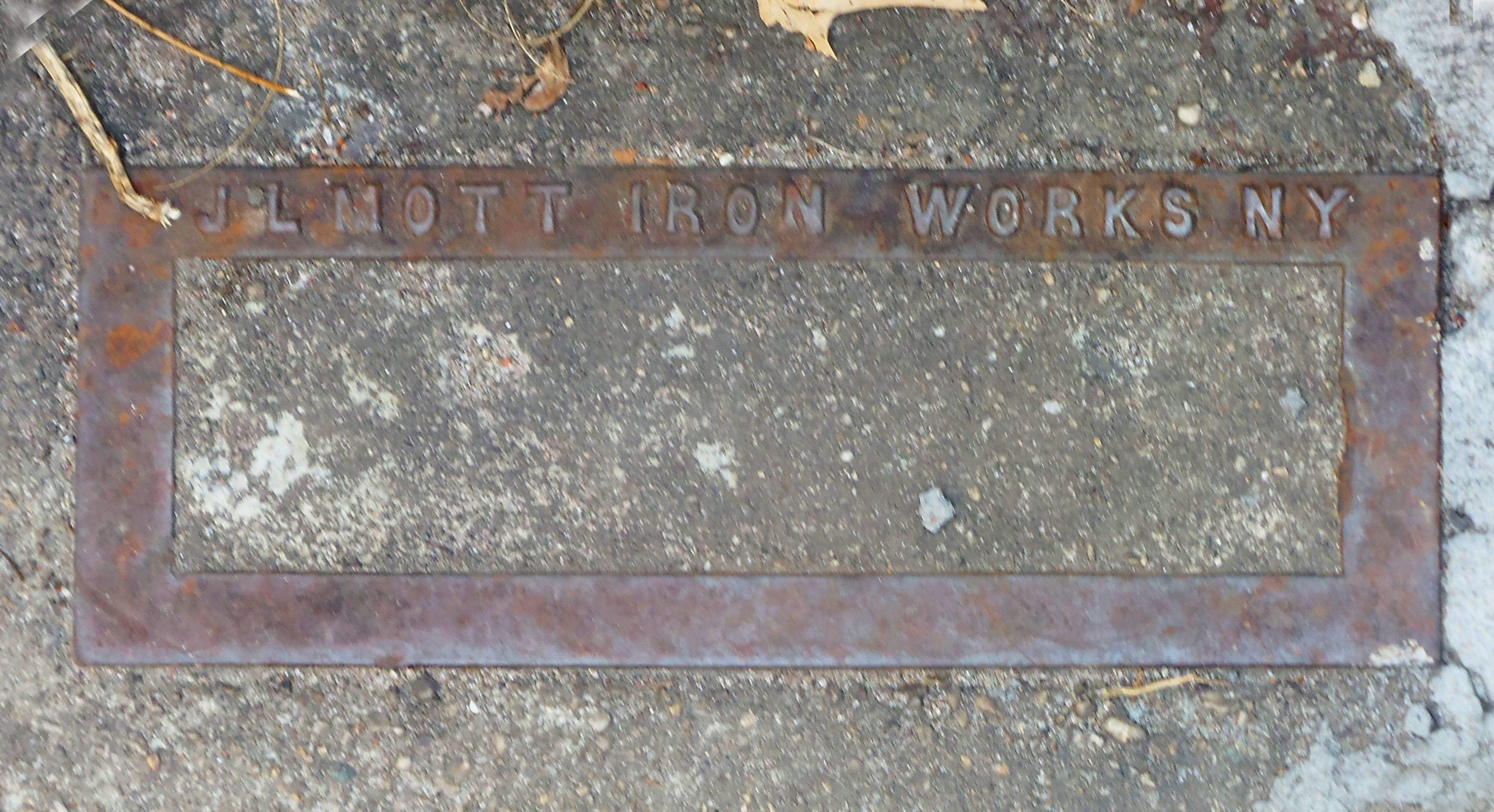 J.L. Mott Iron Works building drain cover