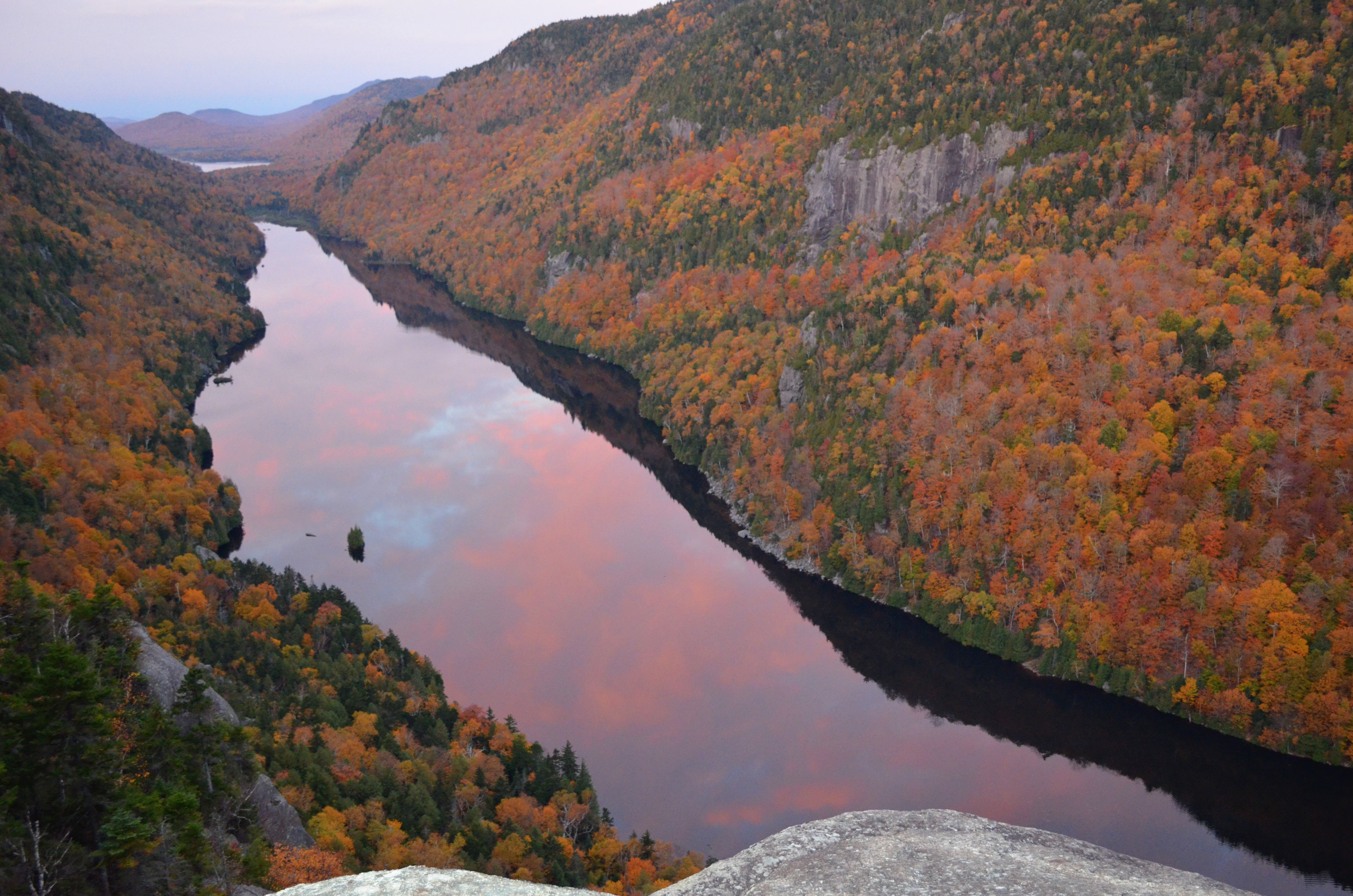 pink dawn clouds reflected in Lower Ausable Lake