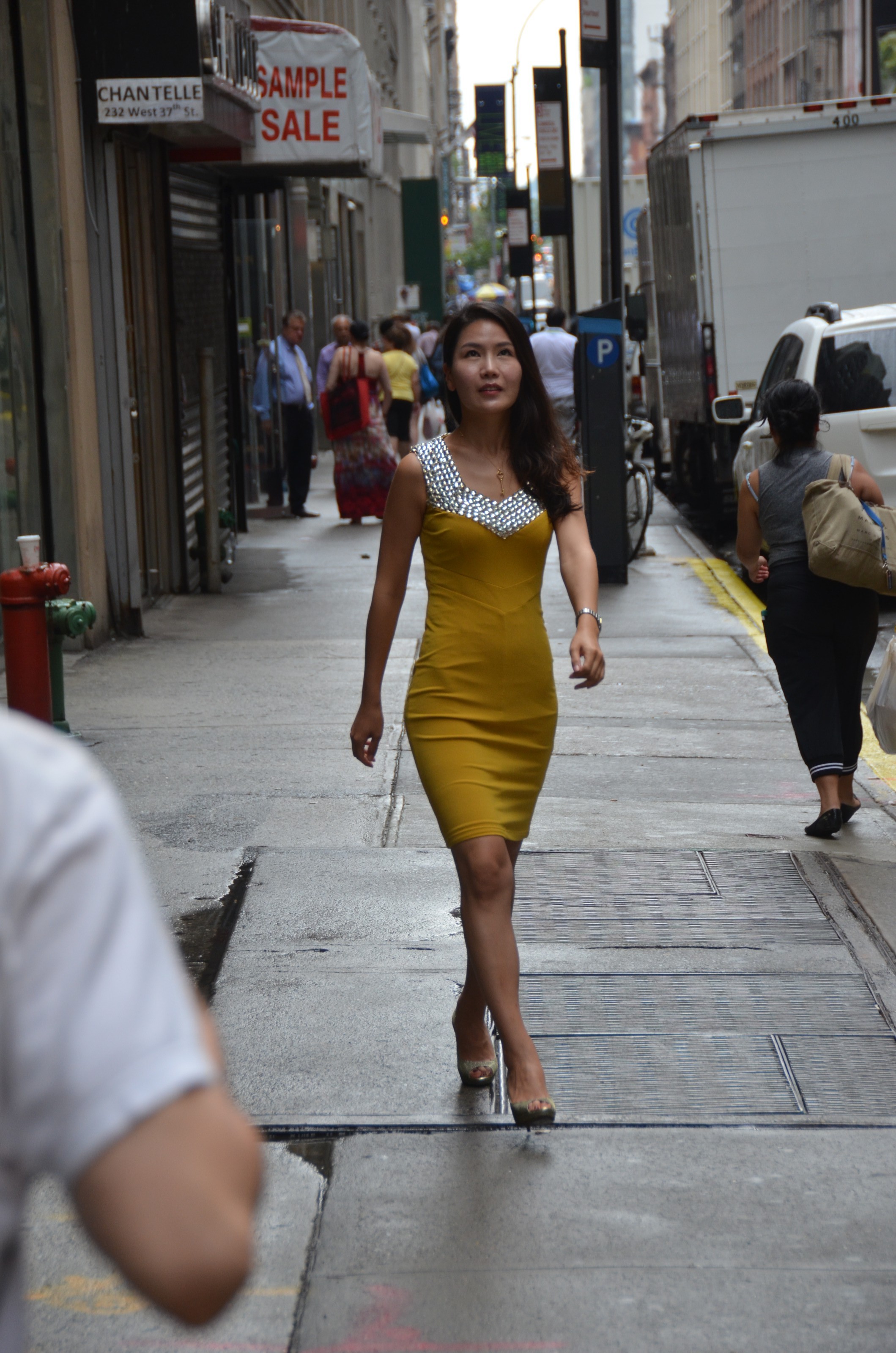 Jinny walking on city street
