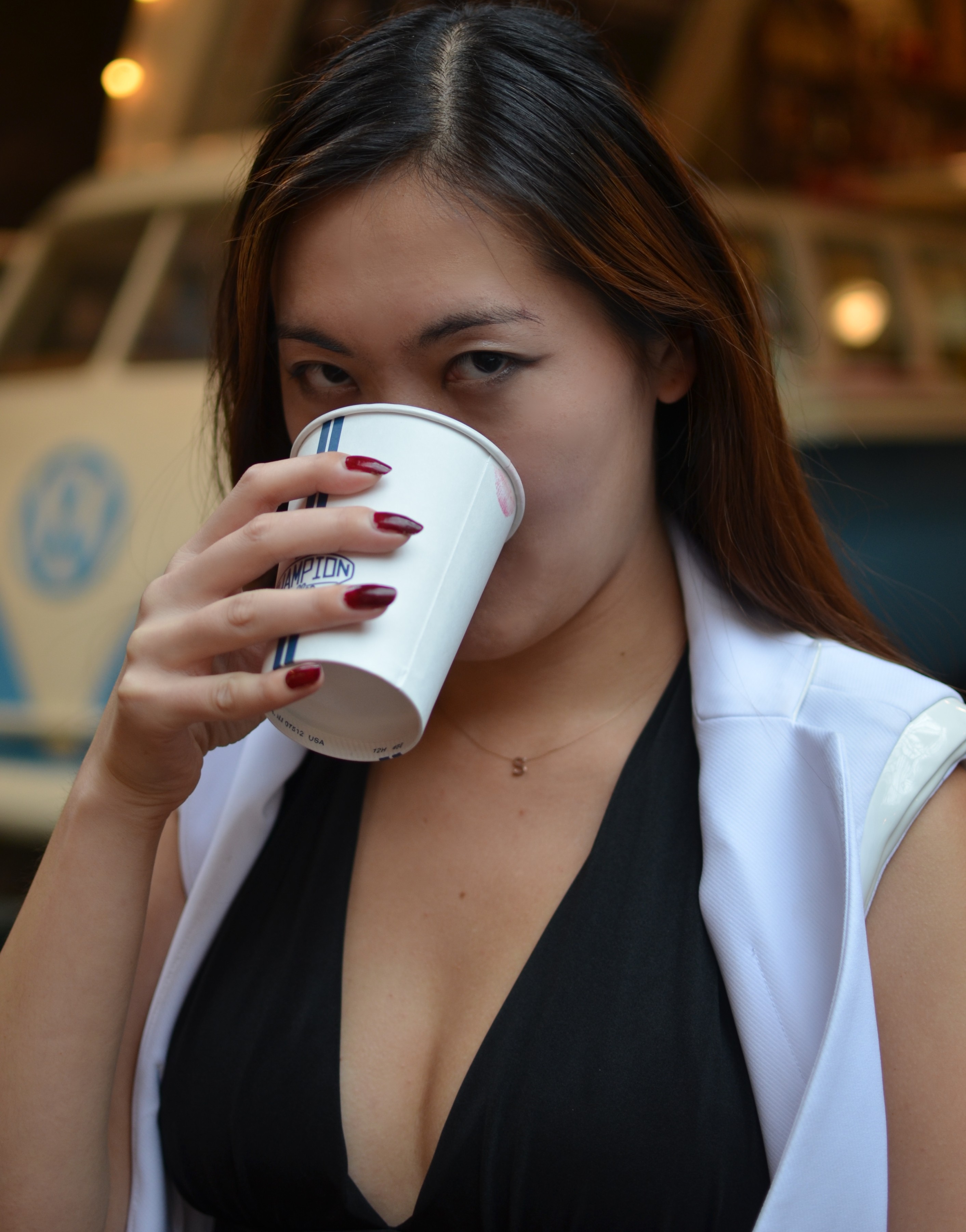 Chinese girl drinking coffee