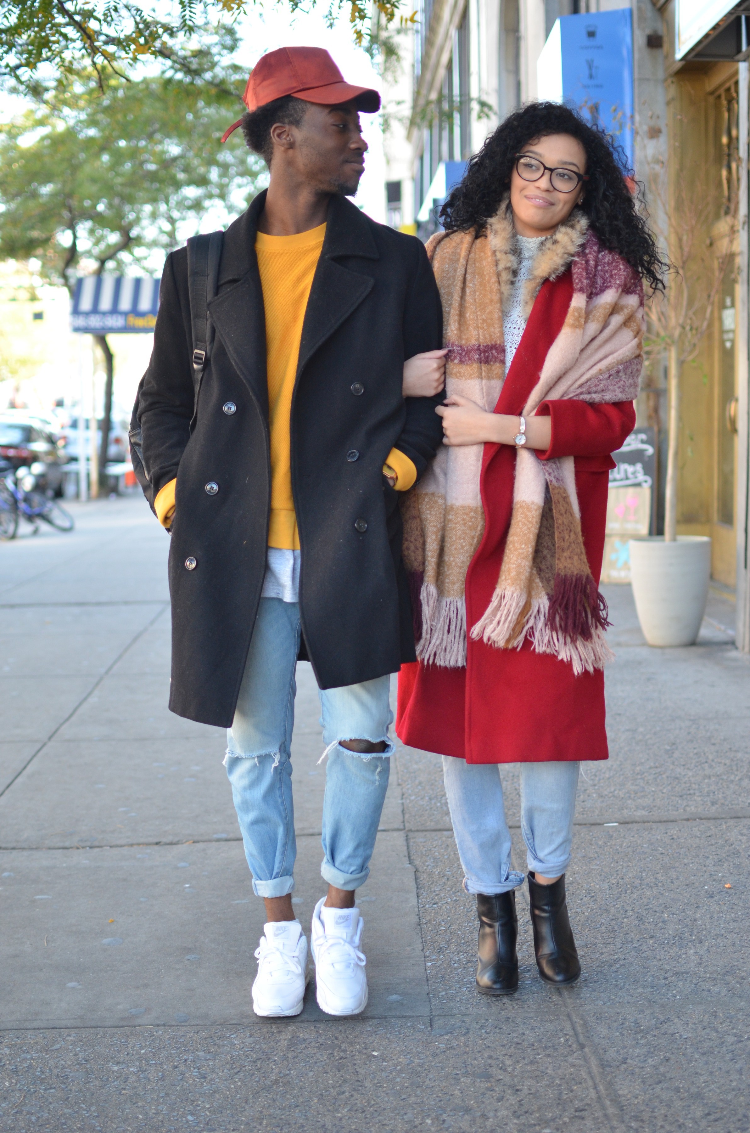 african-american couple in colorful outfits