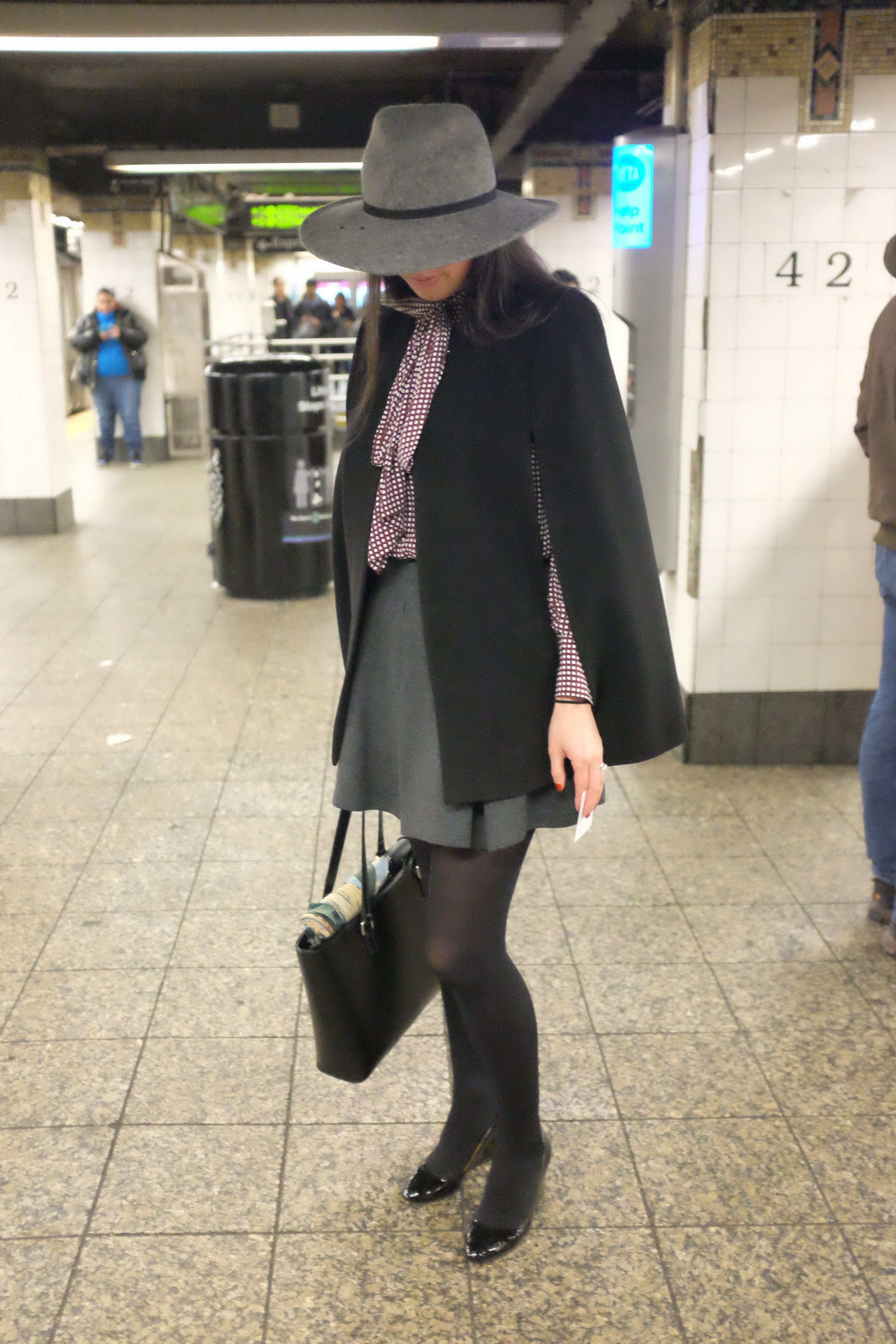 stylish outfit in 42nd street subway station