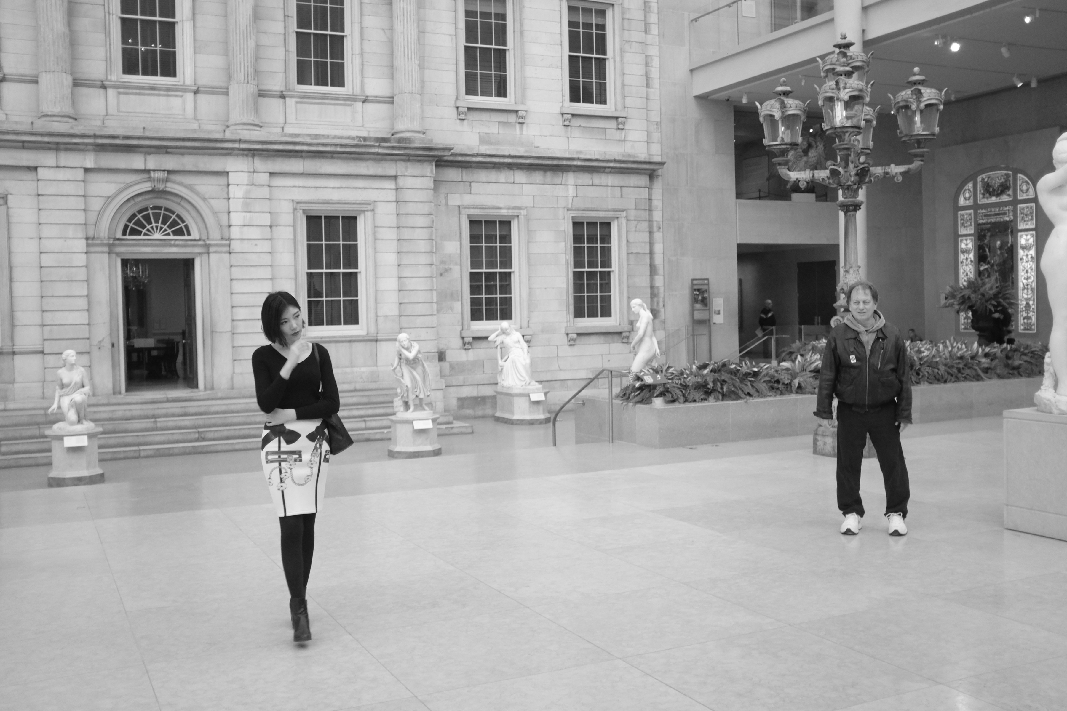 girl in black and white outfit at museum