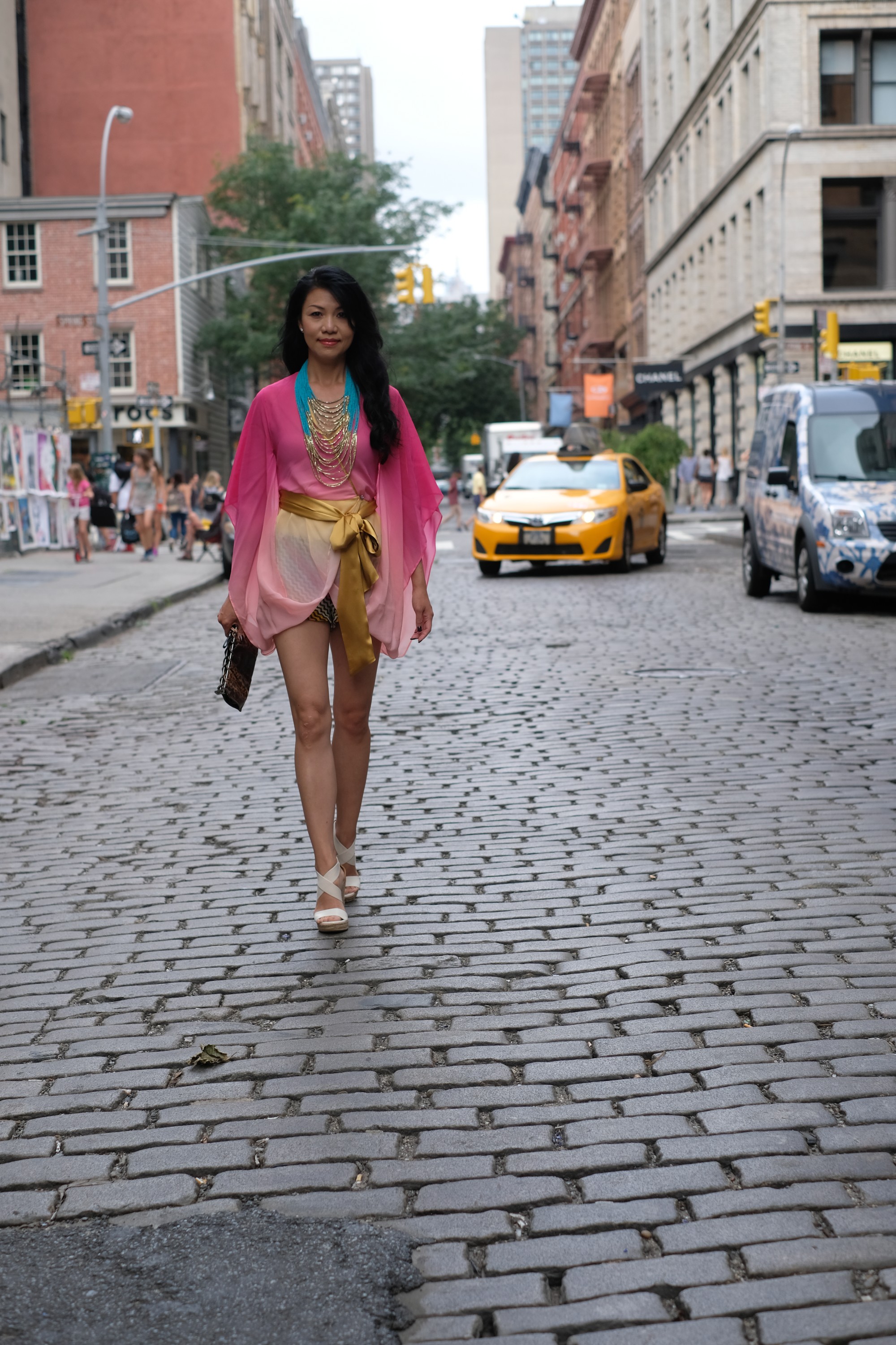 pretty girl in pink outfit in New York City