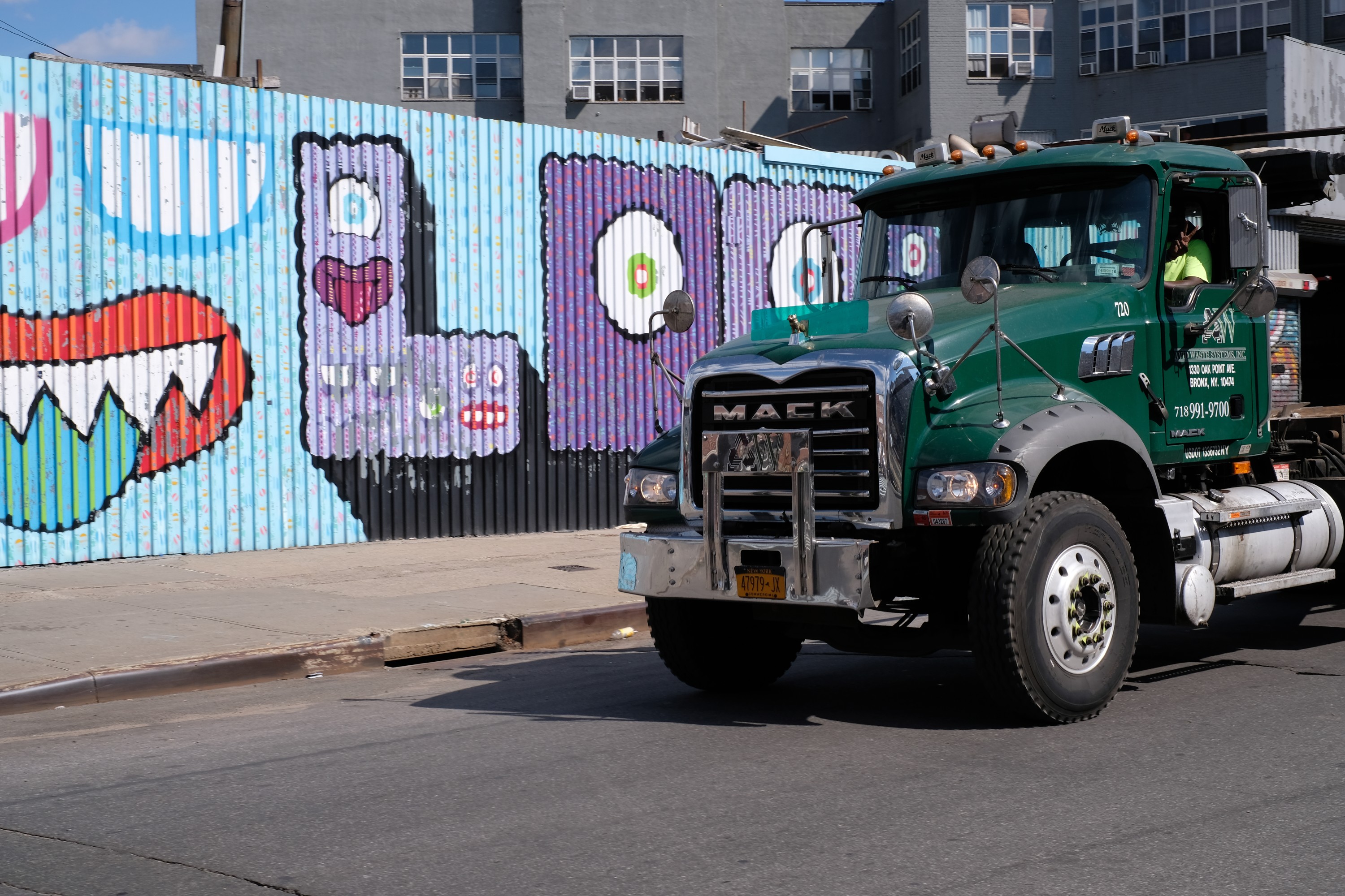 cab of Mack truck by street art