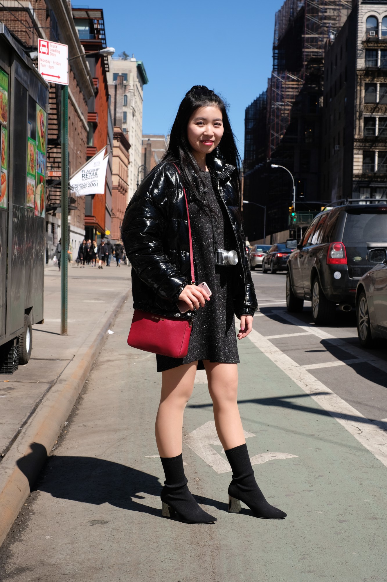 Asian girl in black outfit in NYC